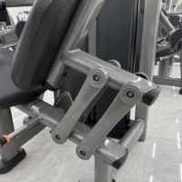 Équipement de musculation professionnel commercial 2026 – Machine à flexions assises robuste avec sélecteur de poids pour l'entraînement des ischio-jambiers en salle de sport
