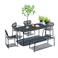 Ensemble table et chaises de jardin en fer forgé de style moderne et épuré pour balcons, cours, jardins, cafés et salons de thé