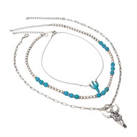 Collier superposé 3 pièces style western vintage avec pendentif tête de taureau, imitation turquoise, chaîne perlée et pompon, vente en gros