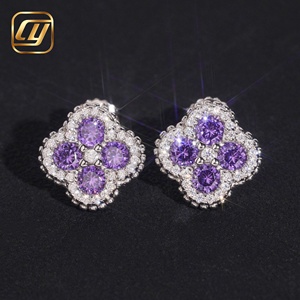Boucles d'oreilles clous en moissanite en forme de fleur, argent 925 plaqué rhodium, bijoux de fête pour femme, luxe, taille brillant rond, sertissage à griffes - Product Image 1