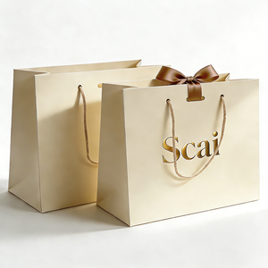 Bolsas de Regalo de Papel Kraft Personalizadas con Asas para Ropa y Ropa Interior, Personalizadas con su Propio Logotipo para Promociones - Product Image 1