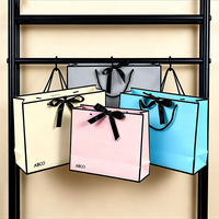 Sac de shopping en carton personnalisé, sac cadeau, sac d'emballage portable noir et blanc avec poignées, pochette de rangement pour articles divers