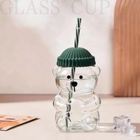 Internetberoemdheid beren-vormig glazen beker van hoog borosilicaatglas met groene siliconen dop en gekleurde rietje