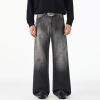 Jeans délavés tendance style américain avec motif encre rétro, coupe ample et droite, en denim