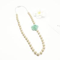 Collier à mâcher populaire en silicone pour enfants avec anneau de dentition sensoriel pour bébé