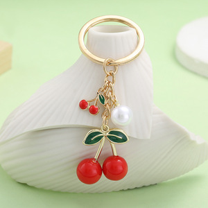 Producto de Comercio Exterior Más Vendido, Llavero de Resina de Color Sólido con Efecto Goteo de Aceite, Llavero de Metal con Perla de Cereza Roja, Accesorio para Llavero - Product Image 1