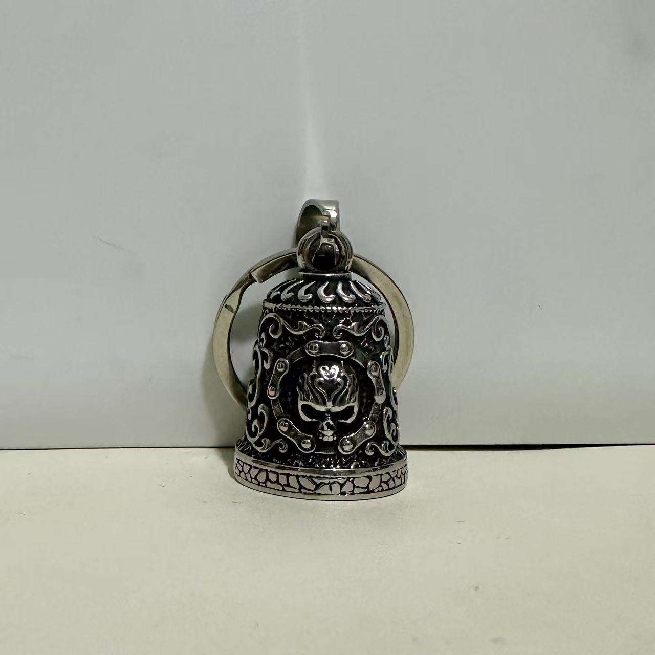 Cloche de crâne de flamme avec porte-clés