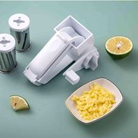 Alat Dapur Pemotong Putar Manual Warna Putih, Bahan Stainless Steel, untuk Mengiris Buah, Sayur, dan Memarut Keju (Plastik) - Promo!