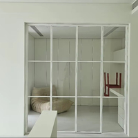 Fabricant de portes pliantes en acier sur mesure, fenêtres à triple vitrage ignifugées, style moderne minimaliste, cadre fin français, extérieur