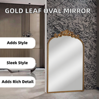 Miroir mural de forme irrégulière vintage orné d'or antique de luxe moderne de qualité supérieure inspiré du baroque
