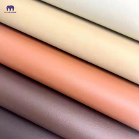 Premium 0.65-1.0mm Résistant À L'abrasion Tissé Rexine Matériel Durable Imprimé Litchi Texture Synthétique PVC Cuir pour Sacs