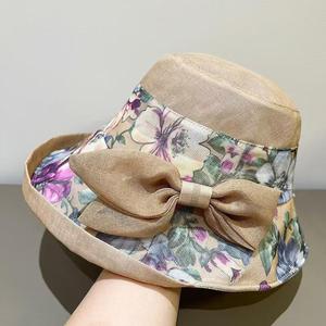 หมวกทรงบักเก็ตประดับโบว์ลายดอกไม้สำหรับผู้หญิง หมวกปีกกว้างกันแดดสไตล์เกาหลี พับเก็บได้ ทำจากผ้าฝ้ายและผ้าลินิน - Product Image 2