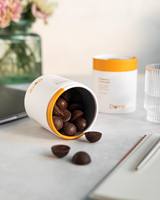 Vente en gros de chocolats recyclés avec logo imprimé boîtes rondes emballage cadeau de luxe personnalisé boîte tube en papier chocolat