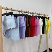 Ensemble de yoga 2 pièces personnalisé avec logo : Soutien-gorge de sport asymétrique, short de course, survêtement, haut de fitness push-up, ensemble short de yoga pour femme