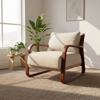 Fauteuil d'appoint moderne en bois massif avec cadre artisanal en cannage et assise rembourrée pour chambre et salon