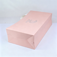 Fabricants de sacs en papier cosmétiques roses de luxe personnalisés avec logo imprimé pour emballages de shampooings et lotions, vente en gros
