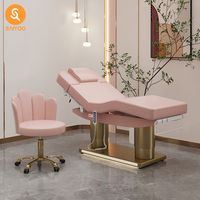 Table faciale de massage électrique pliante rose de luxe avec 4 moteurs et cadre en acier inoxydable