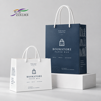 Sac en papier électronique personnalisé avec poignée en corde, impression couleur intégrale, finition mate pour l'emballage d'accessoires mobiles