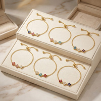 Nouveau bracelet de luxe haut de gamme incrusté de diamants, trèfle à quatre feuilles, pétales de fleurs, en acier inoxydable électroplaqué pour femme