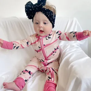 Bebé recién nacido 100% ropa de bambú ropa para niños tela Natural liso sólido volante manga larga Footie cremallera pijamas de bebé