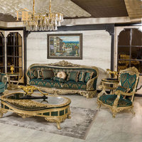 Ensemble de canapés classiques de luxe européens sculptés à la main en tissu vert brodé avec table basse pour salon d'appartement