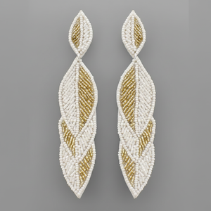 Boucles d'oreilles brodées de fil artistique et de perles - Product Image 1