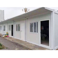 Conteneur de salon extérieur personnalisé Emballage plat Maison préfabriquée en acier couleur laine de roche avec panneau mobile pour la vie urbaine