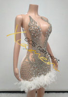 Robe de soirée scintillante Ocstrade 2025 avec strass, décolleté plongeant, sans manches, en cristal transparent, courte, sexy, pour fête d'anniversaire avec plumes