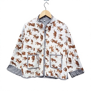 Unisex Hand Block Printed Cotton Quilted <b>Jacket</b> Featuring Crisp Canvas Detailed With Playful Orange Tiger Motifs - Product Image 1