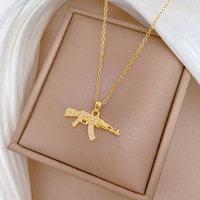 SMing Fashion acier inoxydable AK mitraillette collier de diamants pendentif plaqué or 18 carats bijoux de mode pour femmes