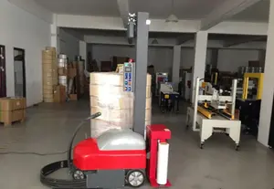 En ventes Système automatique Machine d'emballage de bagages et de marchandises Machine d'emballage industriel Machine d'emballage automatique par robot