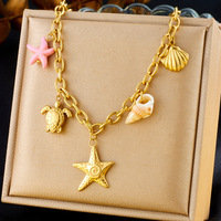Moda de acero inoxidable 18K chapado en oro enlace estrella de mar Concha delfín colgante mujeres gargantillas collar elementos marinos en forma de corazón
