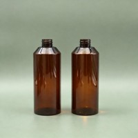 Flacon pompe cosmétique en plastique PET ambré de 450 ml, rond, à épaule plate