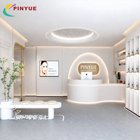 Comptoir de réception personnalisé pour boutique de soins de la peau, étagères murales avec éclairage LED, vitrine de présentation, mobilier d'intérieur pour clinique de beauté, magasin de détail