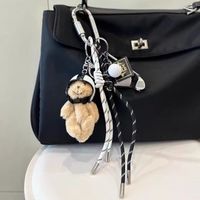 REWIN 2025 Mignon Casque Ours Sac à Main Porte-clés Mousqueton Chaîne Clé de Voiture Football Caméra Cordon Tressé Gland Pendentif de Sac Breloques