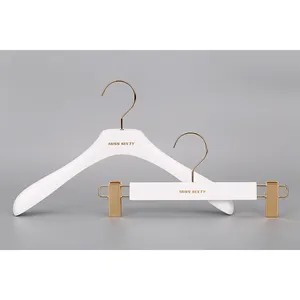 Luxury Custom Gold Printing LOGO White Color Wooden Pants Hanger With Gold Clips For Trousers And Gold Hook