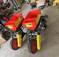 Semoir pneumatique à 2 rangs pour maïs, soja et engrais, pour tracteur marcheur de 10 CV, fabriqué par des fabricants d'engins agricoles.