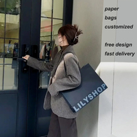 Vente en gros de sacs en papier d'art de luxe avec logo personnalisé, accessoire d'impression offset pour vêtements, chaussures, chaussettes, cadeaux de vente au détail
