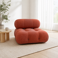 Fauteuil lounge modulaire en velours tufté, canapé simple sans accoudoirs, fauteuil d'appoint terracotta, design italien à profil bas pour salon et hôtel