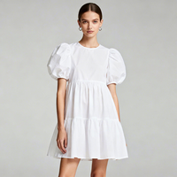 Robe décontractée pour femmes, fabriquée sur mesure par des fabricants de vêtements, avec manches bouffantes larges, col rond et jupe courte, couleur unie