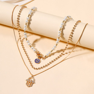 Collares multicapa exagerados para mujer, <span class=keywords><strong>cadena</strong></span> de perlas de imitación, colgante de ojo y <span class=keywords><strong>palma</strong></span> con diamantes de imitación, joyería de fiesta - Product Image 3