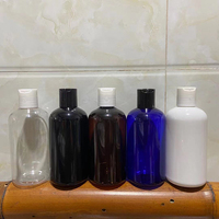 Bouteille de shampooing et de lotion en plastique transparent bleu, noir, ambre, blanc de 250 ml Hengjian avec bouchon à disque pour les soins capillaires