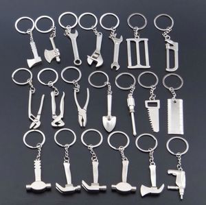 Porte-clés pour hommes, porte-clés de voiture et de sac, outil multifonction portable de poche, comprenant règle, marteau, clé à molette, pinces et pelle - Product Image 1