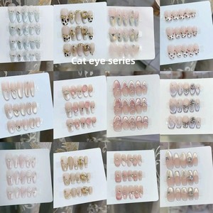 Uñas postizas de gel UV hechas a mano Nai Zi, diseño de cielo estrellado de alta gama, formas de almendra y ovaladas, venta al por mayor, terminadas y reutilizables - Product Image 1