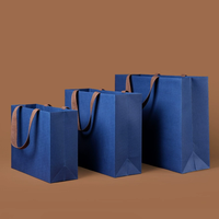 Sac à main en carton ondulé biodégradable haut de gamme personnalisable pour le commerce extérieur, impression de logo pour la promotion de vêtements et de cadeaux, vente en gros