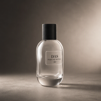 Flacon de parfum de luxe 100 ml en verre cylindrique incurvé avec bouchon noir effet bois, étiquette en relief et pompe dorée, OEM ODM, vente en gros