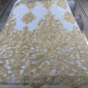 2023 custom reasonable price heavy gold beads sequins embroidery african lace fabric for nigerian party