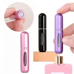 Botella de Perfume con Tapa Dorada, Cuerpo de Aluminio y Herramienta de Prensado, Diseño Metálico Elegante - Product Image 2