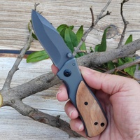 Couteau pliant de camping de survie en plein air EDC étanche manche en bois couteau de poche boîte de rangement en acier inoxydable OEM personnalisable