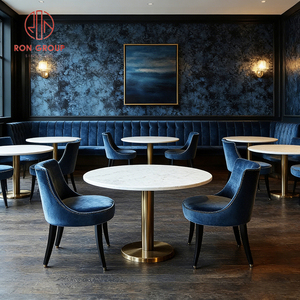 Juego de Muebles de Restaurante Modernos y Lujosos: Sofá de Terciopelo Azul Marino con Botones y Mesa Redonda de Mármol Blanco - Product Image 6